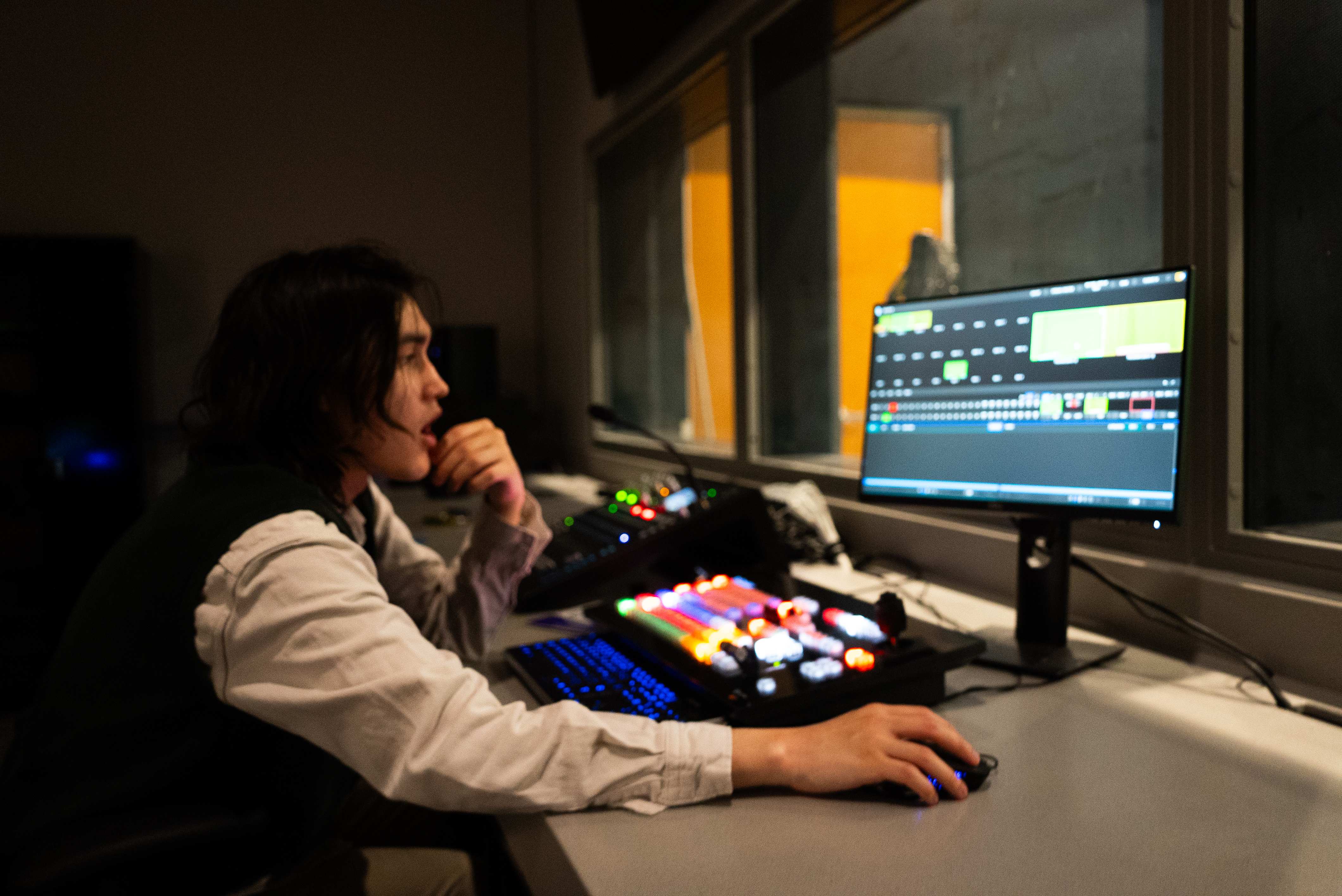 Editor working at a production workstation